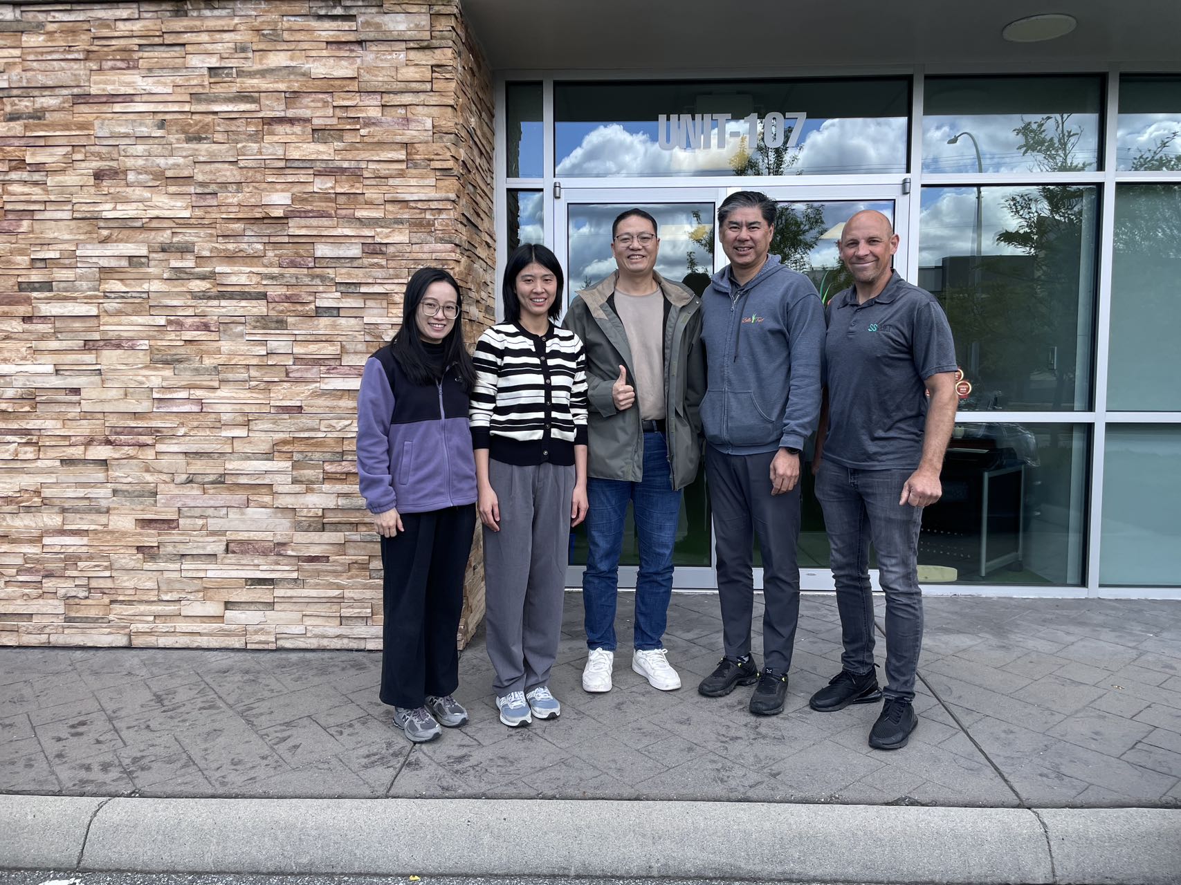 Mecofence team discussing fence solutions with Canadian partners