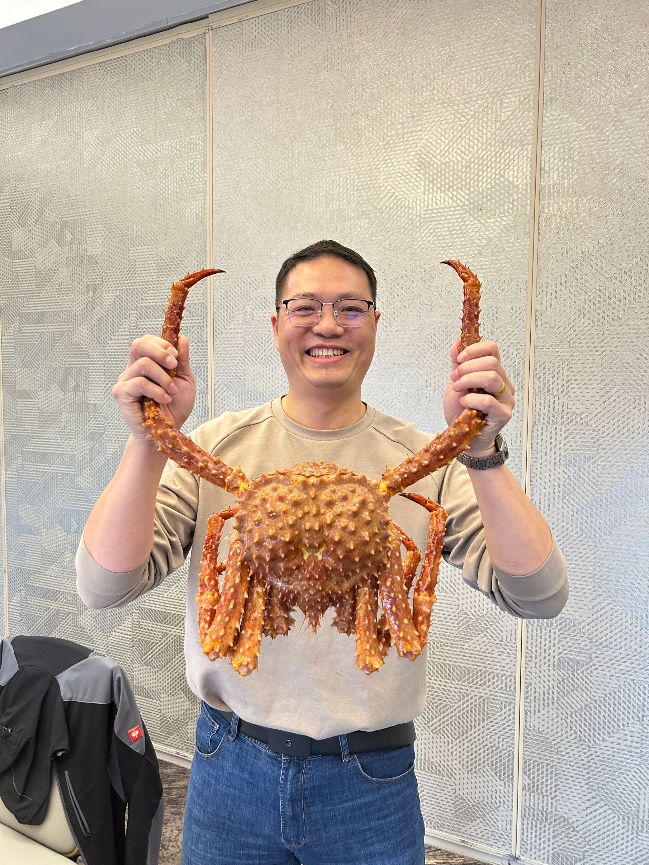 Mecofence team enjoying Alaskan crab during business trip in Canada